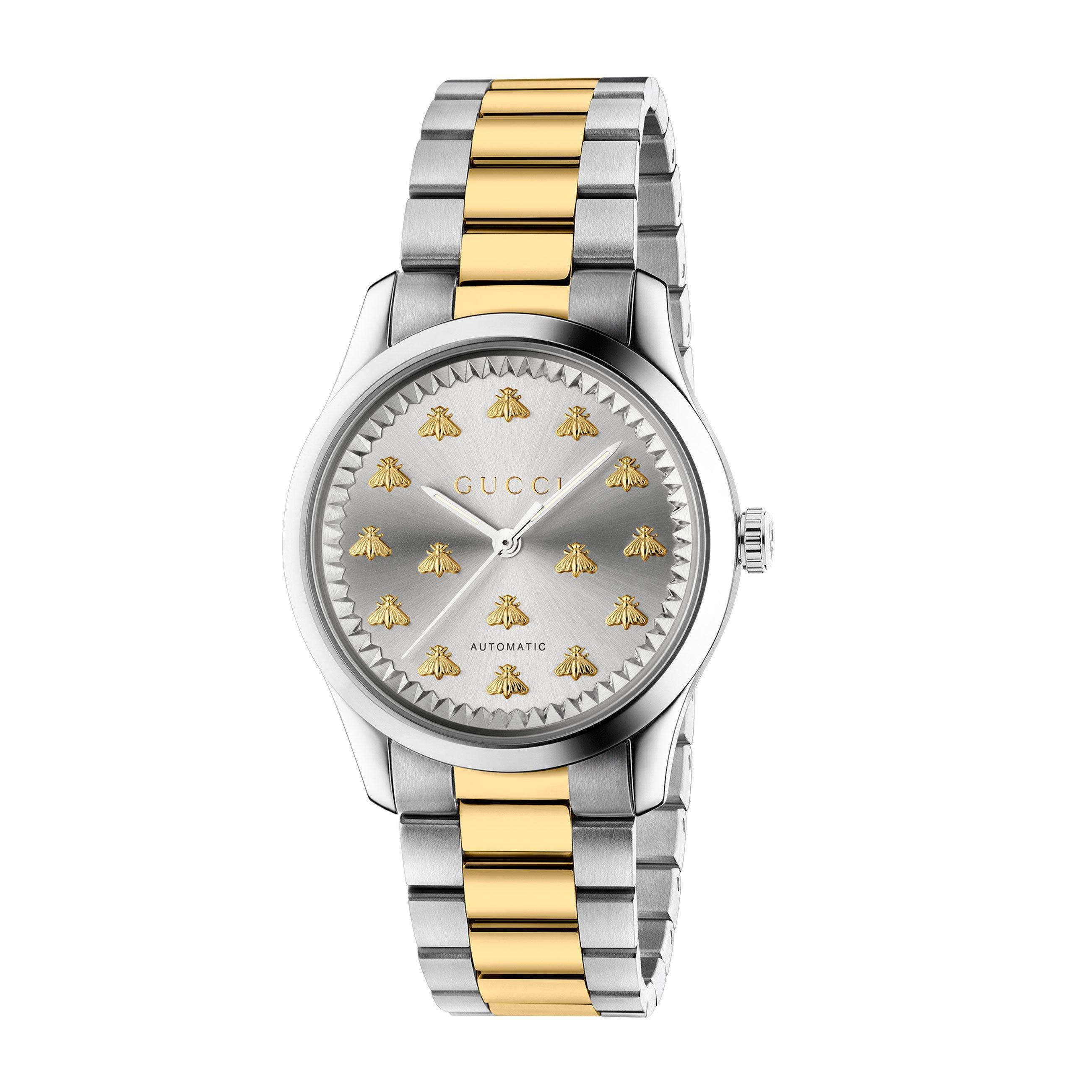 gucci g-timeless stainless steel and 18ct gold watch