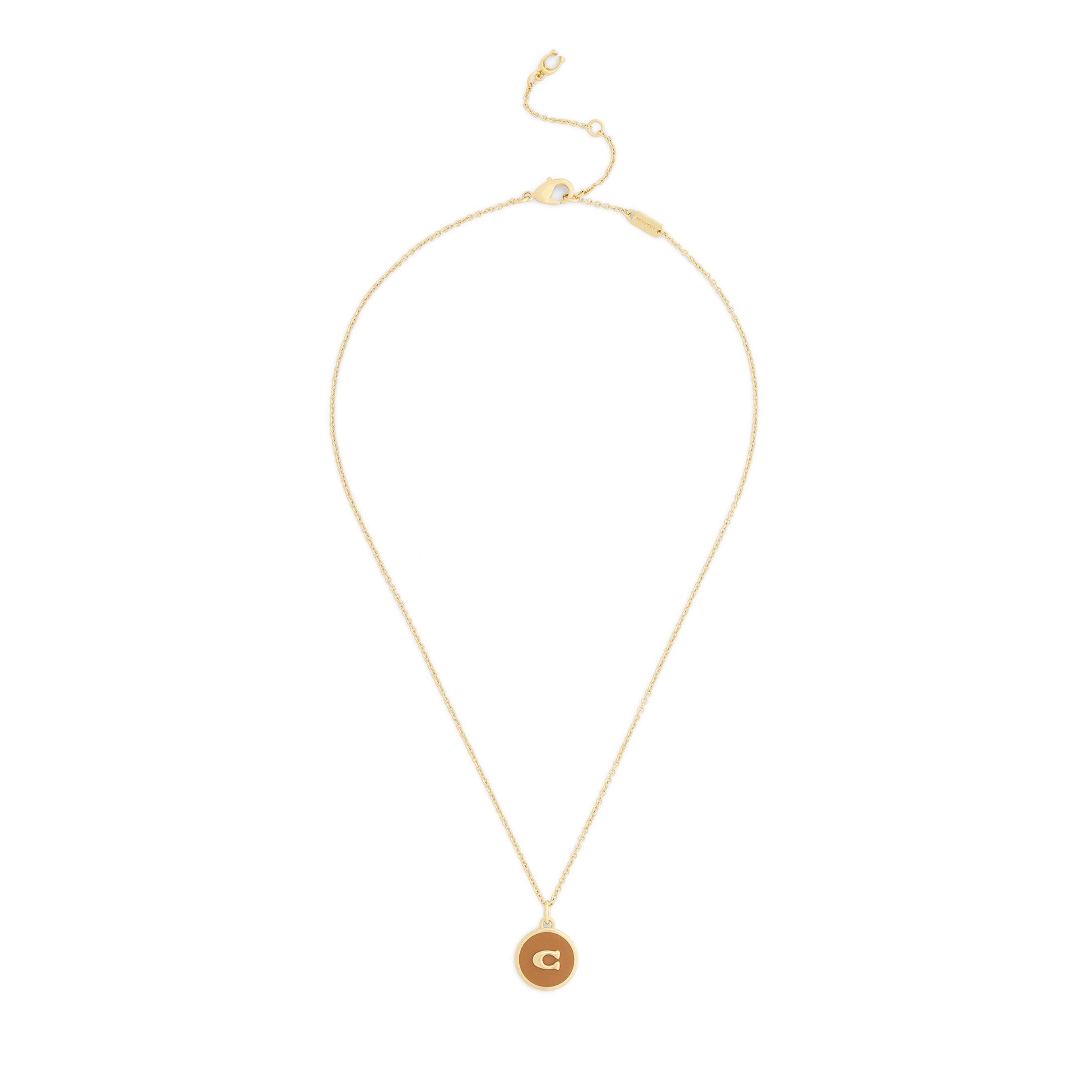 Coach Yellow Gold Tone Pendant