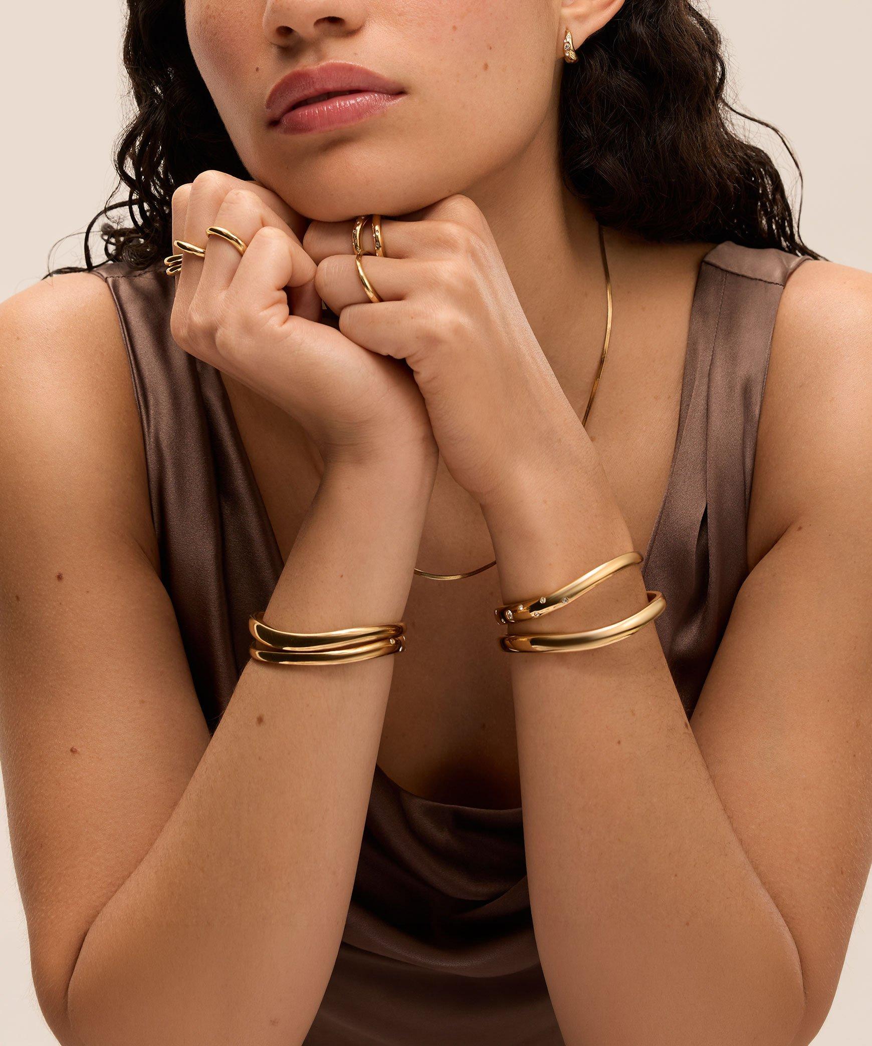 Woman wearing D.Louise jewellery