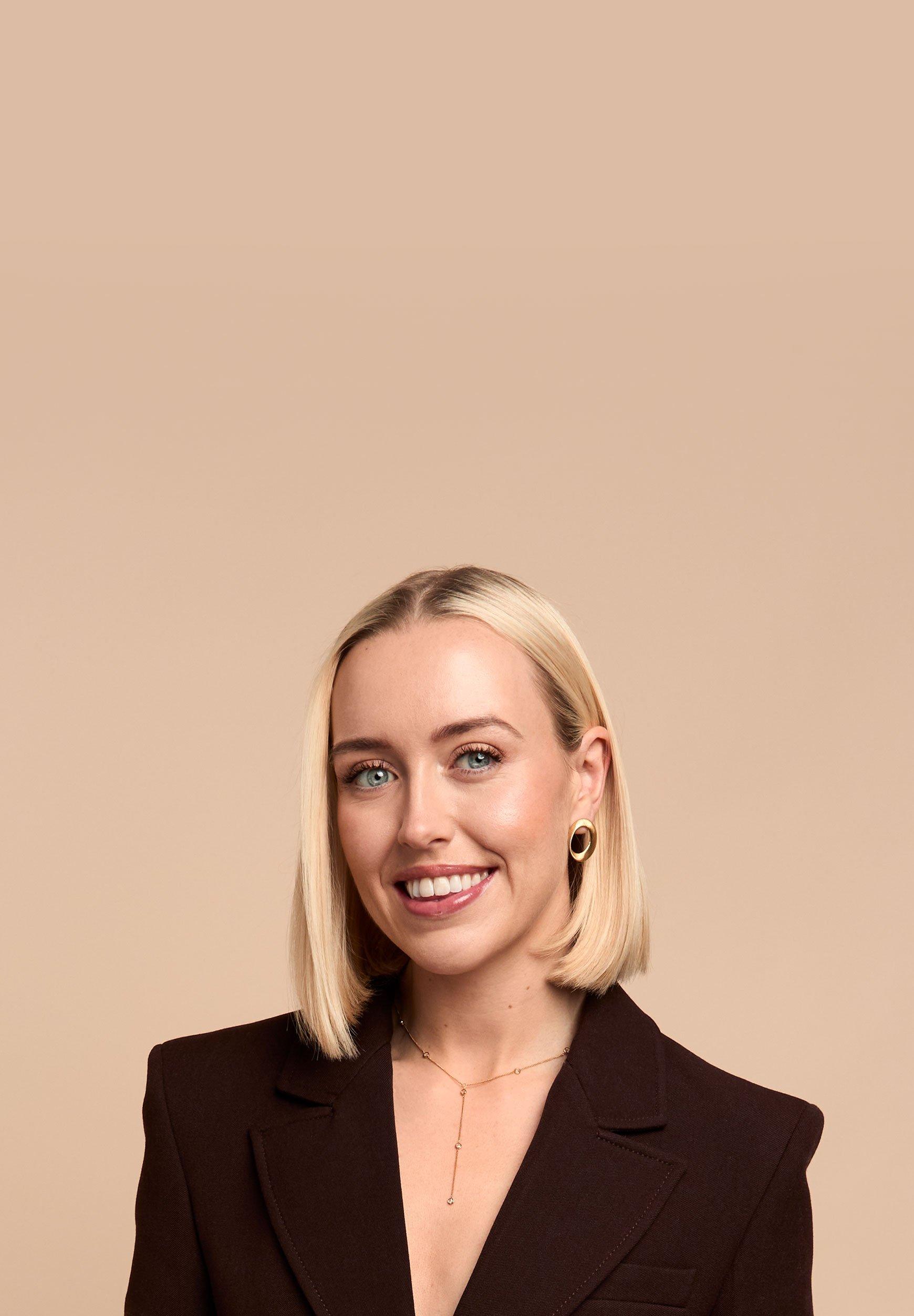 Woman wearing D.Louise jewellery