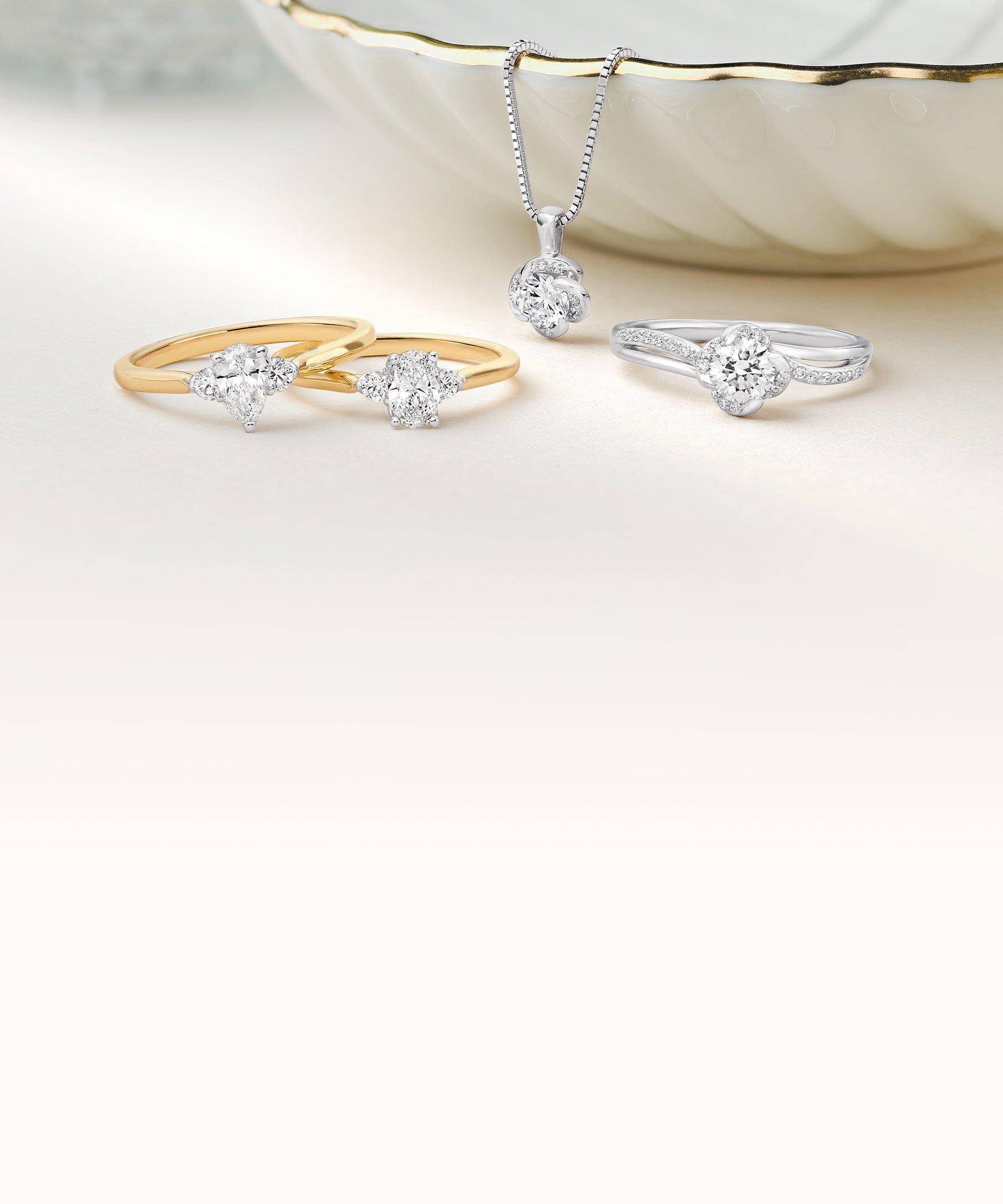 White gold diamond rings from the Maple Leaf 'Wind's Embrace' collection.
